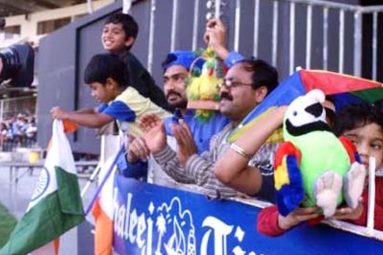 A section of Indian fans visibly enjoying the proceedings. Coca-Cola Champions Trophy 2000/01, 3rd Match, India v Zimbabwe, Sharjah C.A. Stadium, 22 October 2000