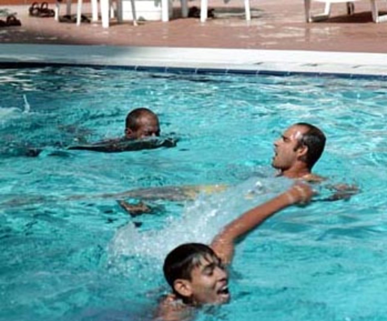 The Sri Lankans enjoying themselves in the cool water. Coca-Cola Champions Trophy 2000/01, Sharjah, 22 October 2000