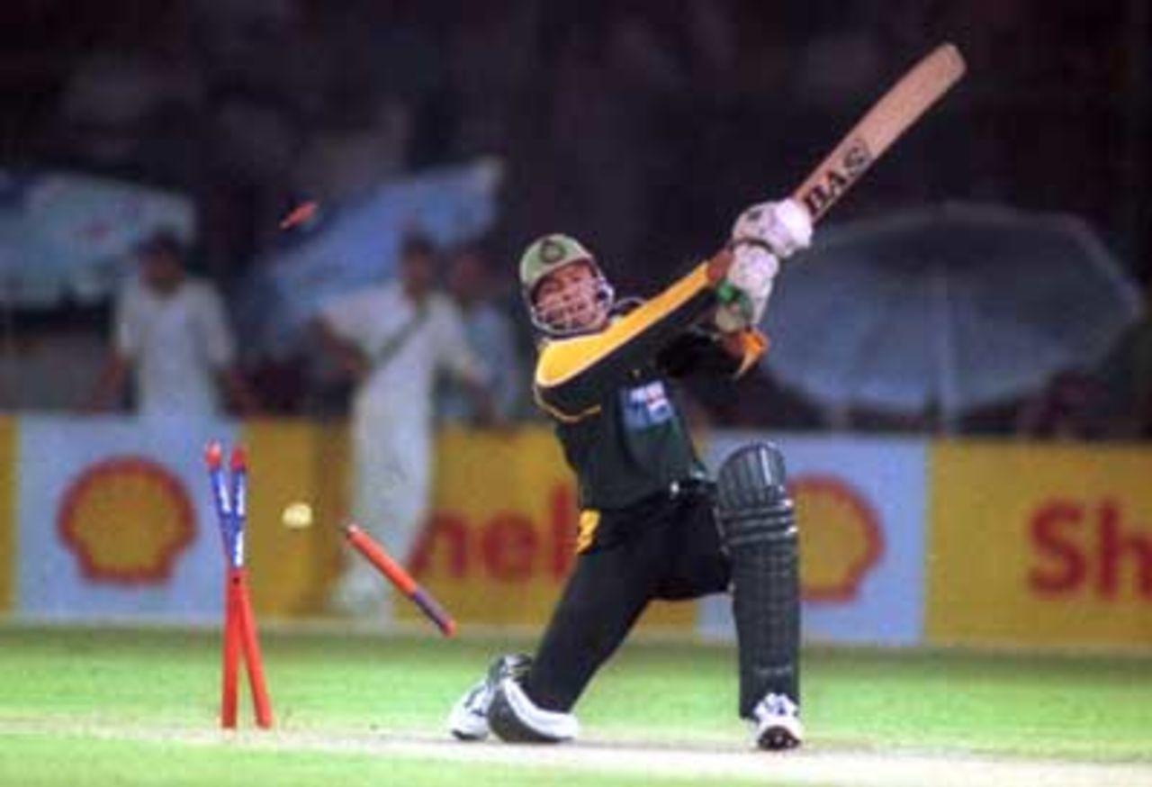 Saqlain has his stumps shattered as he tries to accelerate the Pakistan total,  England v Pakistan, 1st ODI At National Stadium Karachi, 24 October 2000