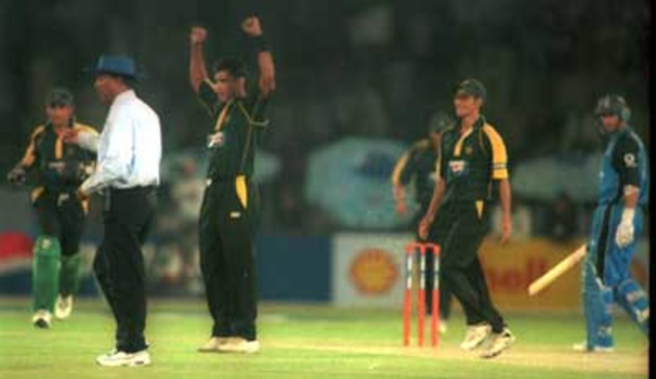 Waqar jubilant at the dismissal of Trescothick (not in the picture),  England v Pakistan, 1st ODI At National Stadium Karachi, 24 October 2000