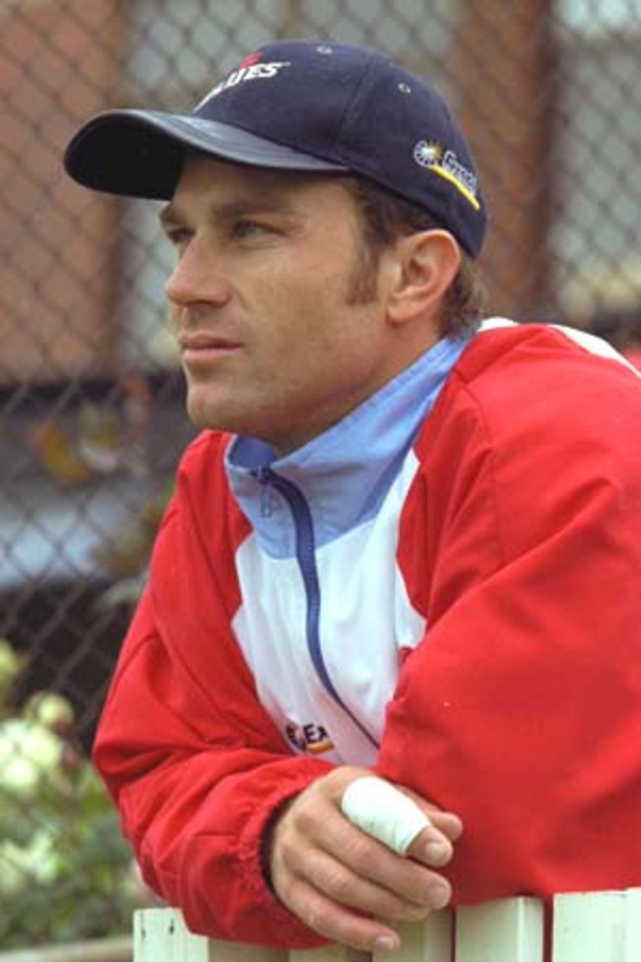 25 Oct 2000: Injured NSW batsman Michael Slater waits for the weather to clear to allow a start to the Pura Cup match Victoria versus New South Wales, to be played at the Punt Road Oval, Melbourne, Australia.