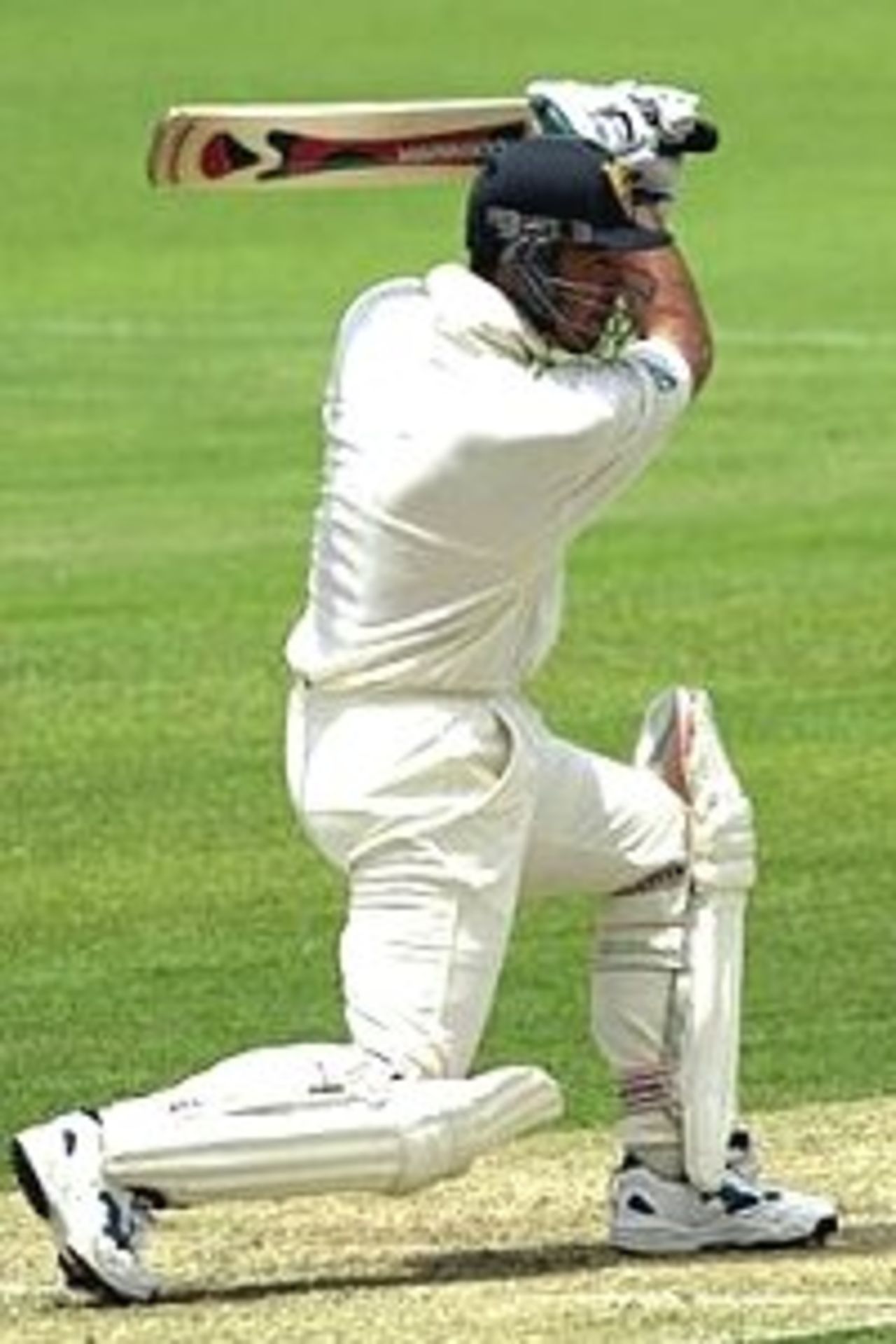 26 Oct 2000: Ricky Ponting of Tasmania hits four runs against Queensland during the Pura Cup cricket match between Queensland and Tasmania played at the Allan Border Field in Brisbane, Australia.