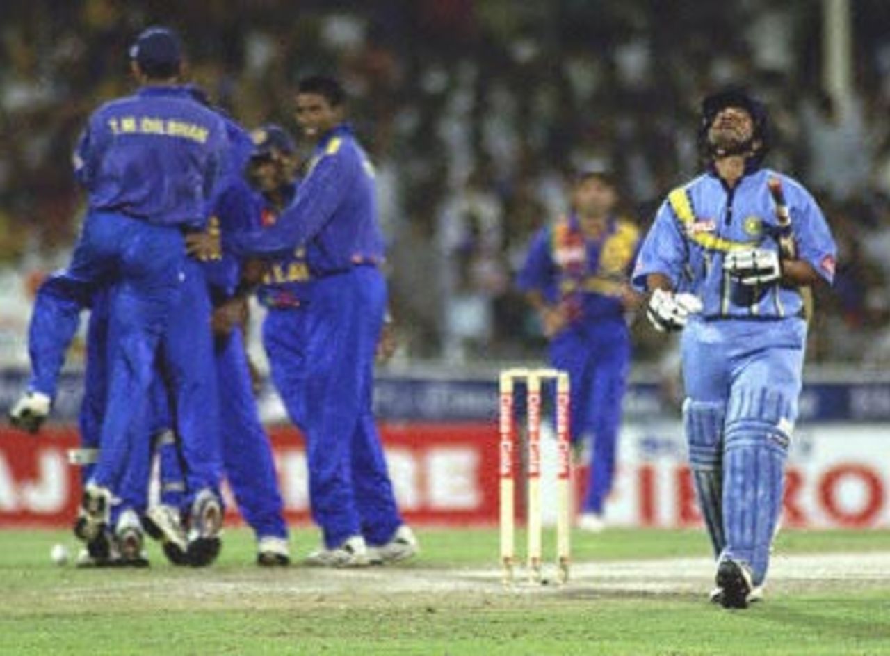A terribly disappointed Tendulkar walks back as the Sri Lankans are delighted, Coca-Cola Champions Trophy, 2000/01, Final, India v Sri Lanka, Sharjah C.A. Stadium, 29 October 2000.