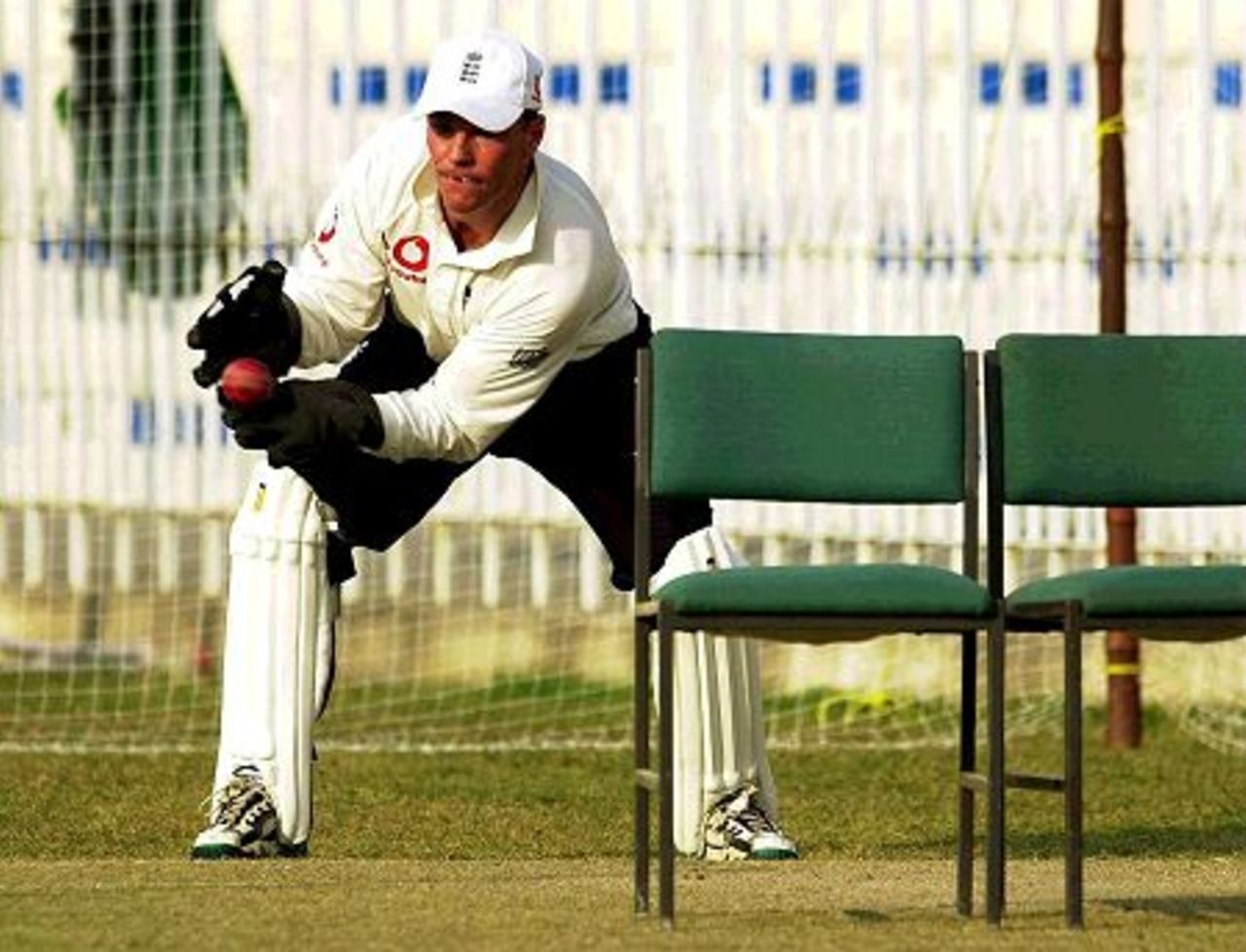 31 Oct 2000: Paul Nixon of England practices with chairs as wickets during the England nets session prior to the start of a 4 day tour match at the Pindi Stadium, Rawalpindi, Pakistan.