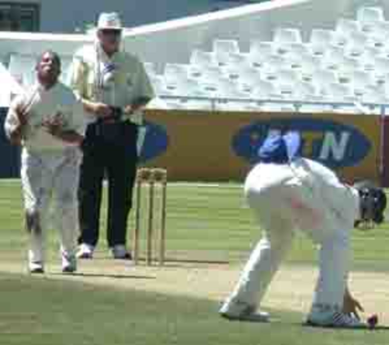 Paul Adams grimaces as a catch falls short of Graeme Smith against Easterns