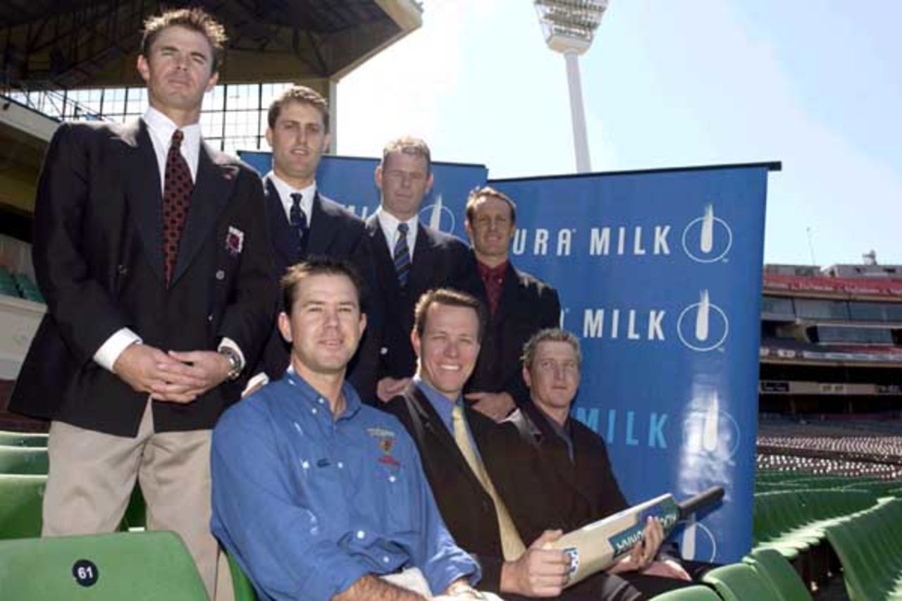 9 Oct 2001: Greg Blewett (Sth Australia), Simon Katich (Western Australia), Paul Reiffel (Victoria), Wade Secombe (Queensland), Ricky Ponting (Tasmania), Kieren Perkins, and Brad Haddin (NSW) during the launch for the 2001/2002 Pura Cup Cricket Season, held at the MCG, Melbourne, Australia.