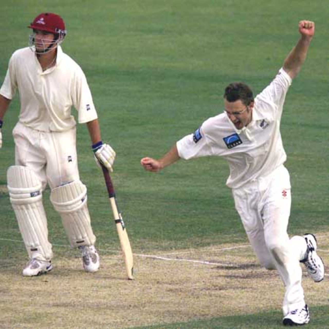 18 Oct 2001: Daniel Vettori of New Zealand celebrates a wicket during the match between New Zealand and the Queensland XI played at the Allan Border Field, Brisbane, Australia.