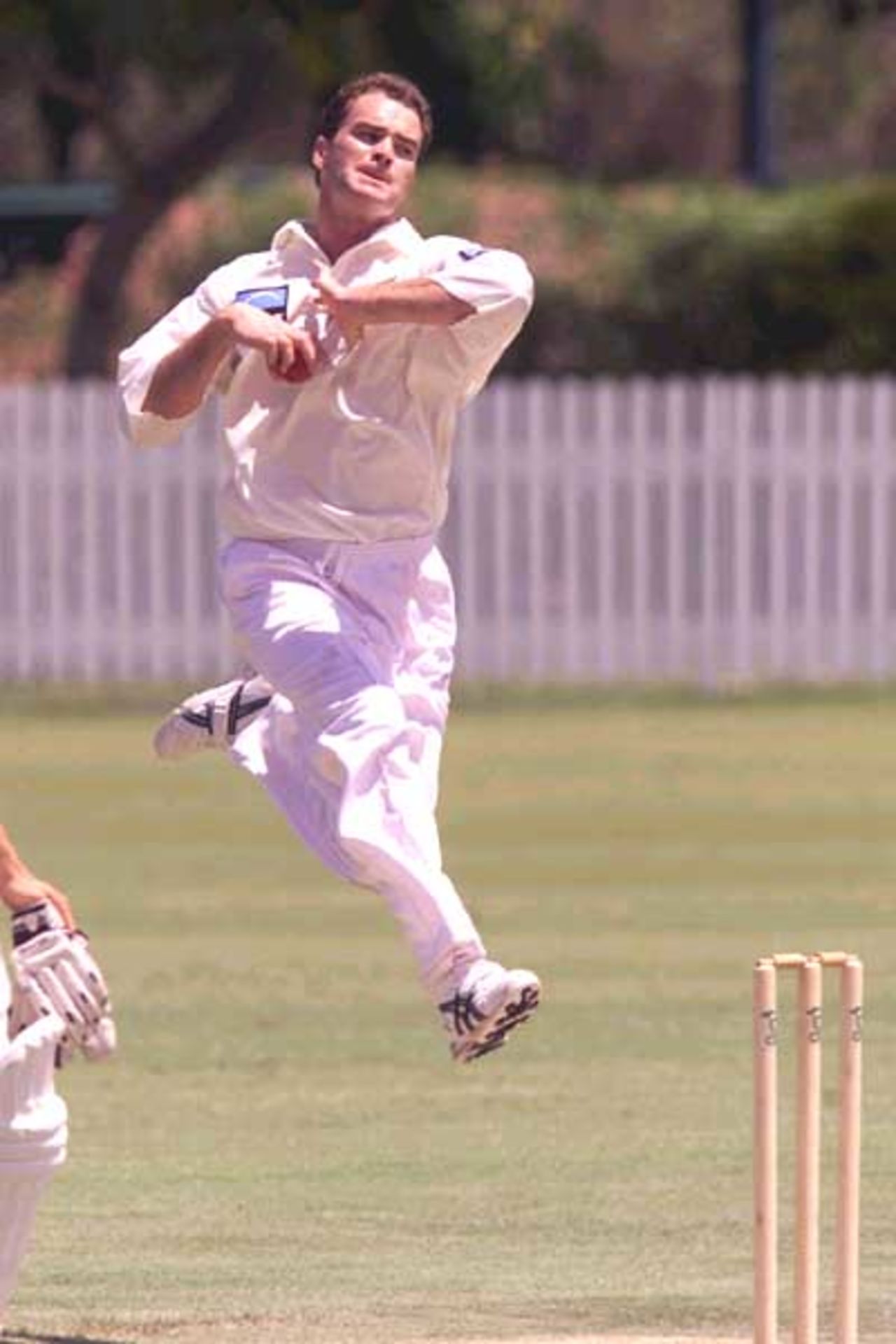 18 Oct 2001: Dion Nash of New Zealand in action during the match between New Zealand and the Queensland XI played at the Allan Border Field, Brisbane, Australia.