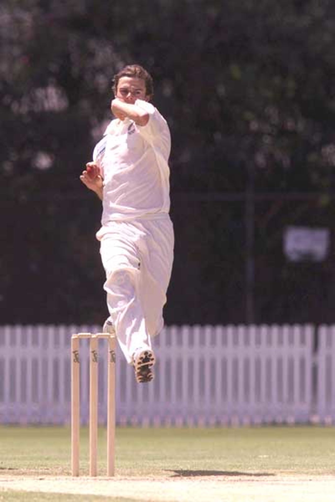 18 Oct 2001: Chris Martin of New Zealand in action during the match between New Zealand and the Queensland XI played at the Allan Border Field, Brisbane, Australia.