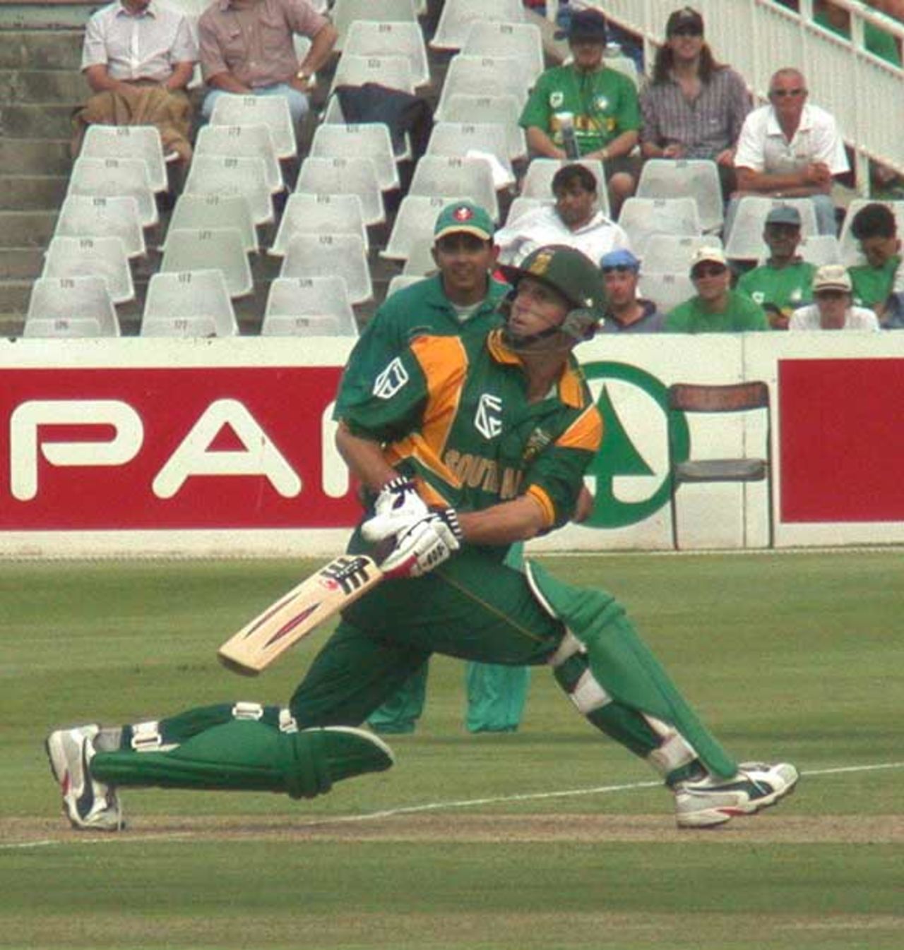 Gary Kirsten sweeps a ball to the fine leg boundary at Newlands on Monday