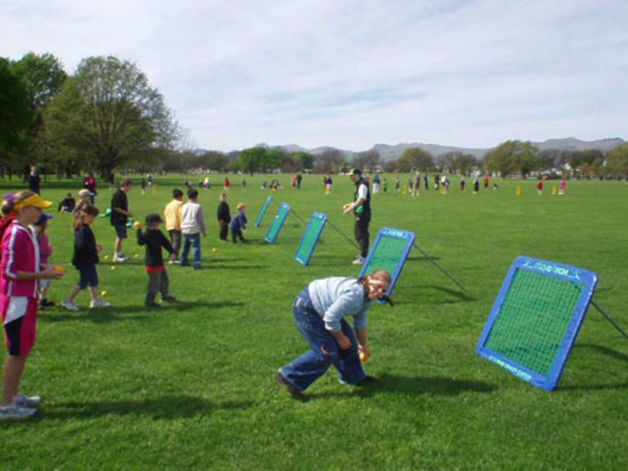 Children practice their fielding skills at a MILO Have-A-Go Day at Hagley Park, Christchurch, 1 October 2002.