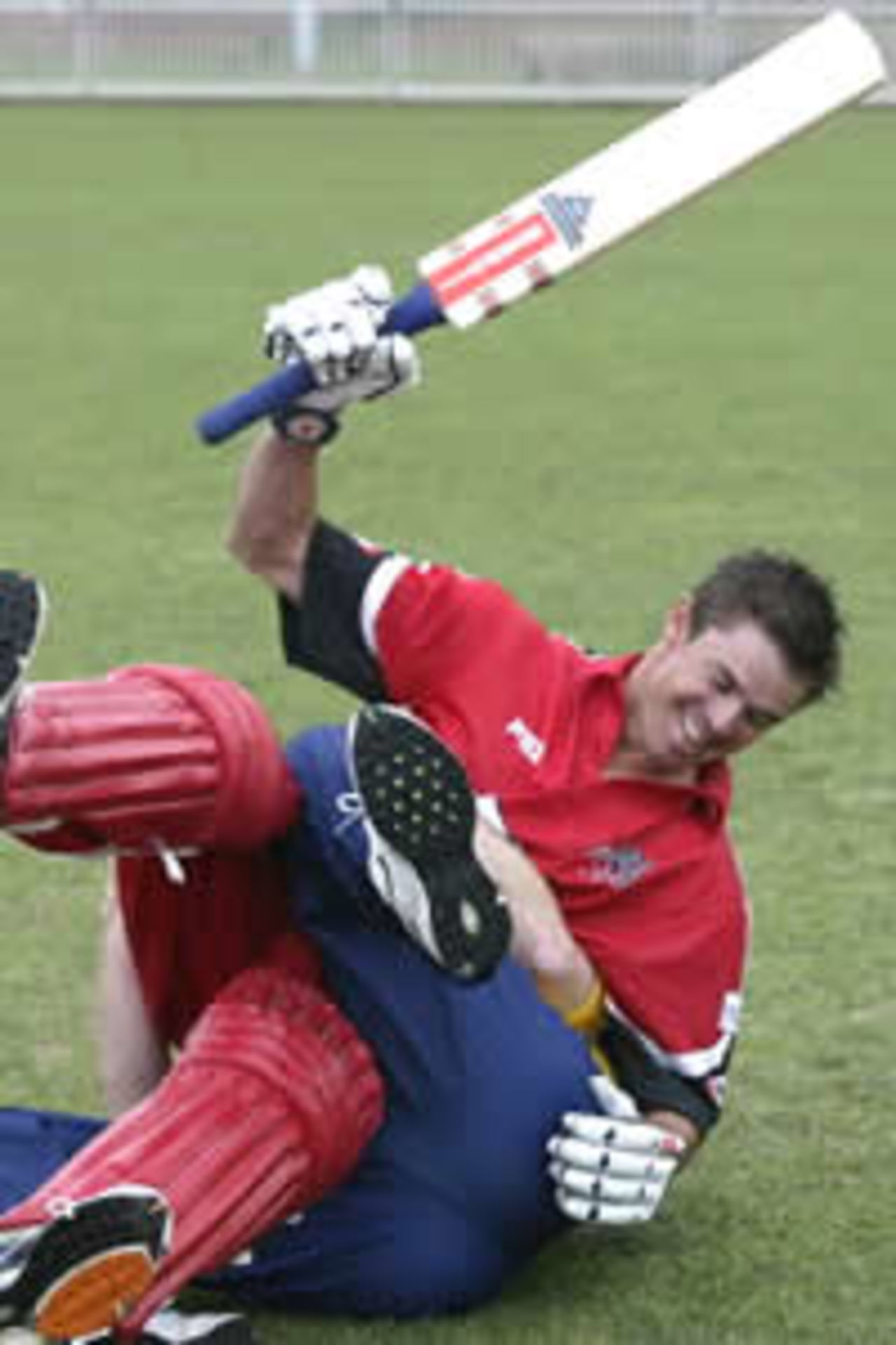 SYDNEY - OCTOBER 9: Greg Blewett of South Australia is tackled by Ian Harvey of Victoria during the launch of the 2002-2003 ING Cup, One Day Cricket Competition, at Drummoyne Oval in Sydney, Australia, October 9, 2002.