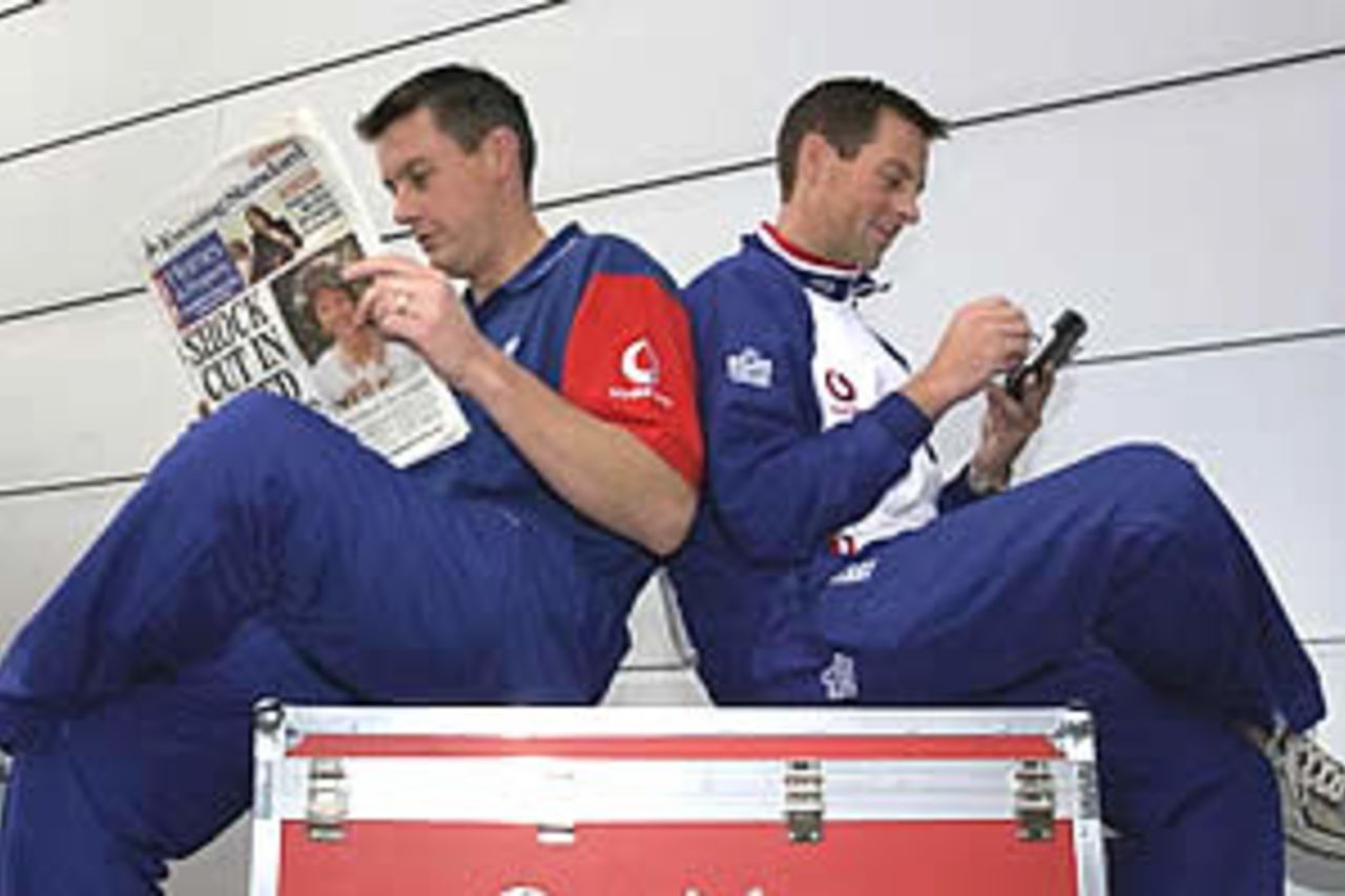 HEATHROW - OCTOBER 16: Englands Ashley Giles and Marcus Trescothick (R)during a England press conference prior to their departure for the Ashes Tour at the Marriot hotel, Heathrow on October 16, 2002.