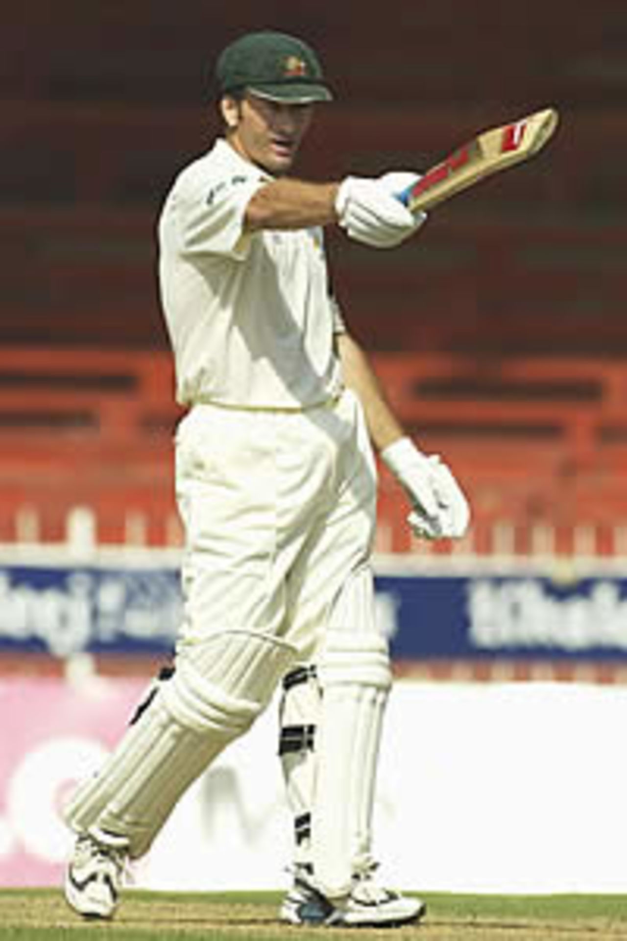 SHARJAH - OCTOBER 20: Steve Waugh of Australia celebrates his century, during day two of the Third Test between Pakistan and Australia, played at Sharjah International Cricket Stadium, Sharjah, United Arab Emirates on October 20, 2002.