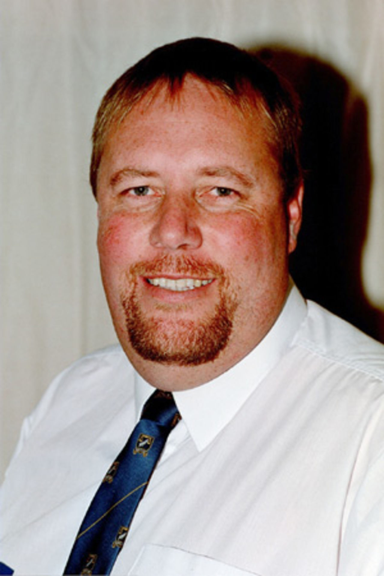 Portrait of Dave Ellwood, New Zealand reserve panel umpire in the 2002/03 season.