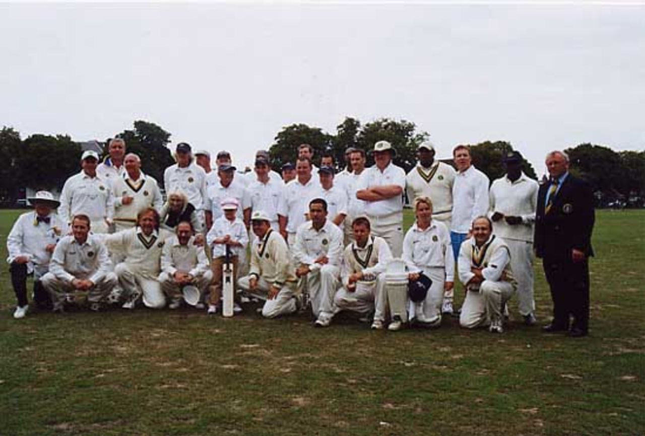 Barmy Army v Bunburys posing for the post-match photo Twickenham CC 2002