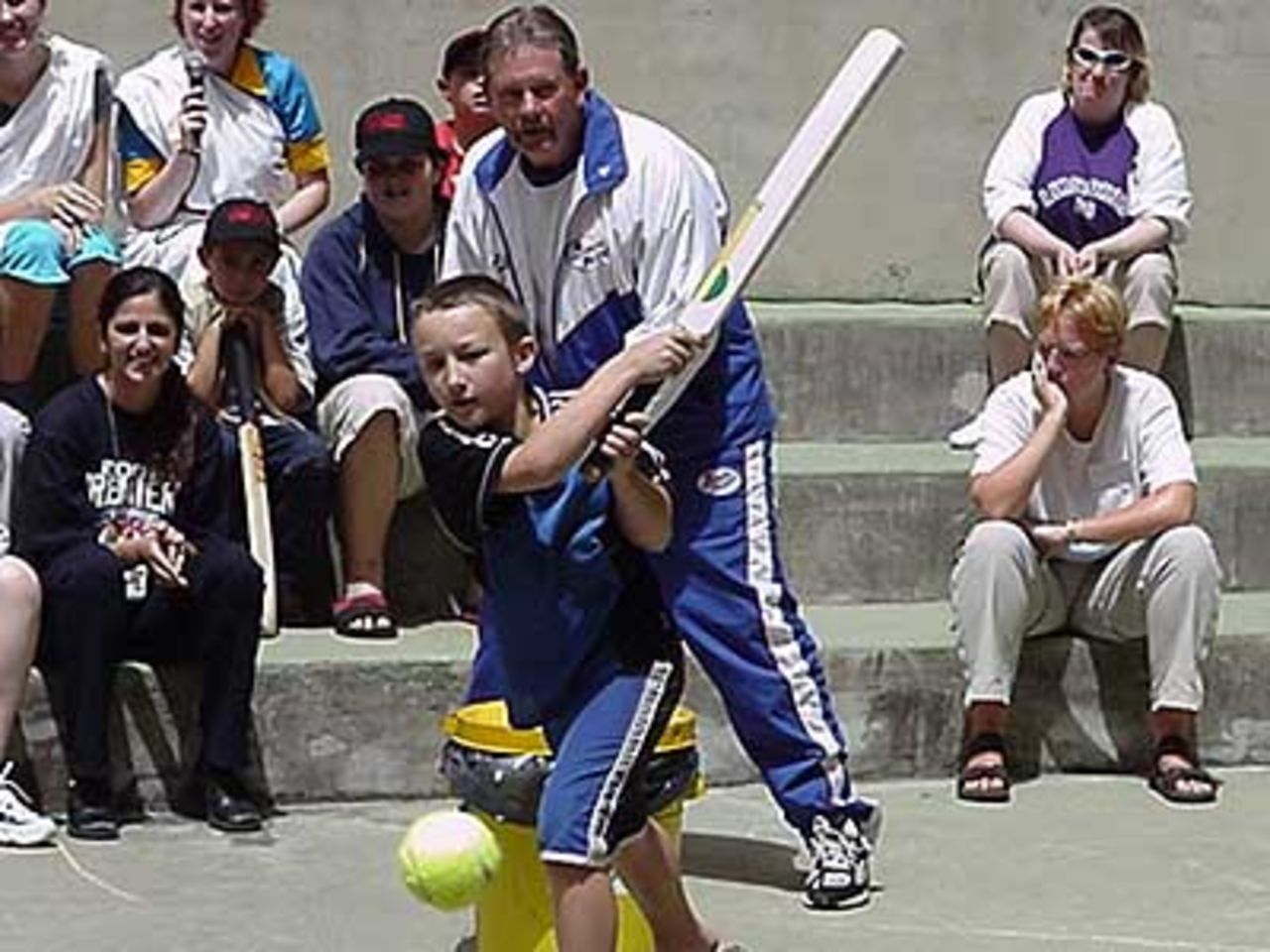 24 Oct 2002: New South Wales coach Steve Rixon keeps wickets in a fun game that the SpeedBlitzBlues played at the Sydney Children's Hospital, Randwick for International Children's Day