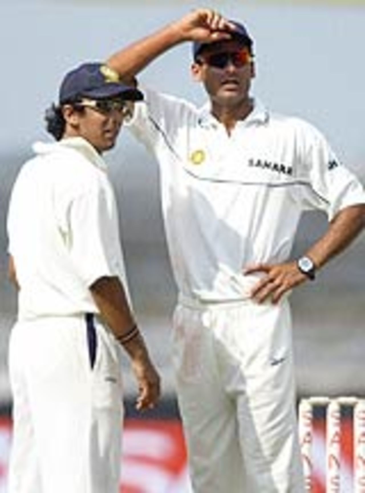 Rohan Gavaskar and Mohammad Kaif discuss tactics during the first day of the warm-up match between the New Zealand cricket team and India-A at Rajkot, October 2,  2003