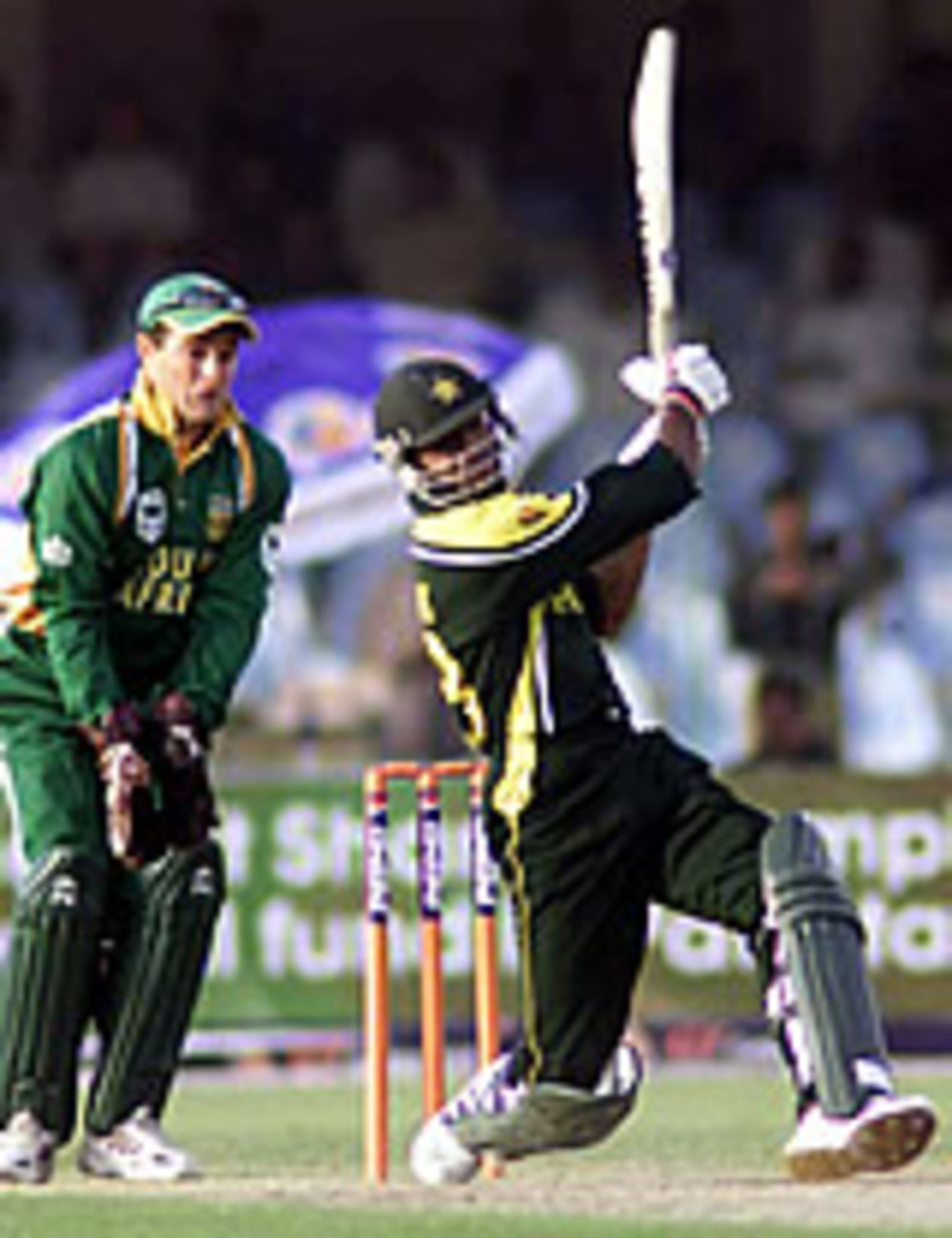 Shoaib Malik hits one out of his 6 sixes, Lahore, Ist ODI, Pakistan v South Africa, 3 October 2003