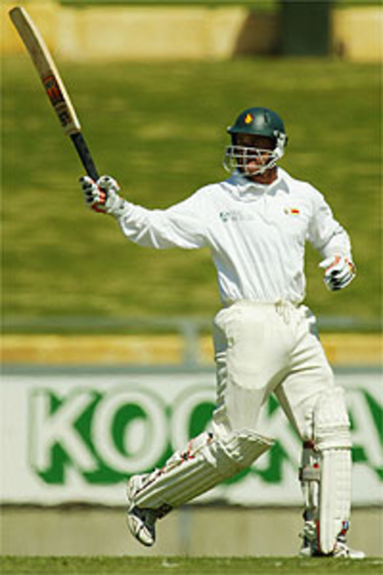 Craig Wishart of Zimbabwe reaches his century during day two of the tour match between Western Australia and Zimbabwe played at the WACA on October 4, 2003 in Perth, Australia.