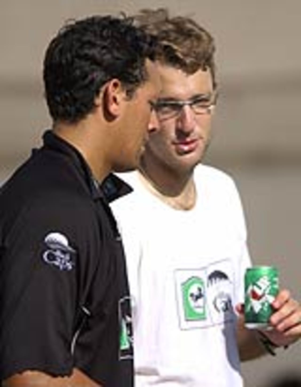 Daryl Tuffey and Daniel Vettori chat as New Zealand prepare for the first Test against India which starts on Wednesday, October 6, 2003
