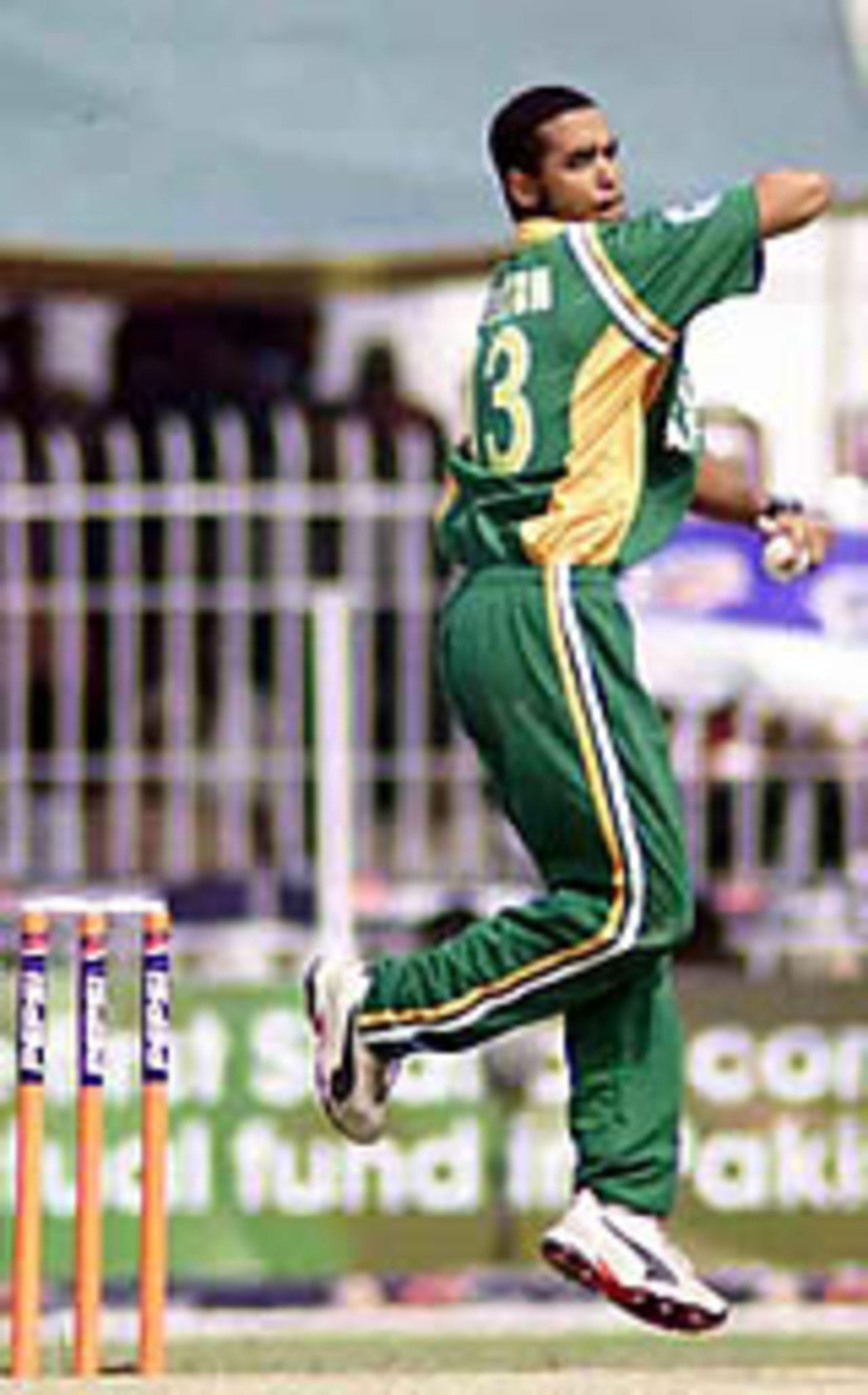 Robin Peterson in his follow through, Pakistan v South Africa, 3rd ODI, Faisalabad, October 7, 2003.