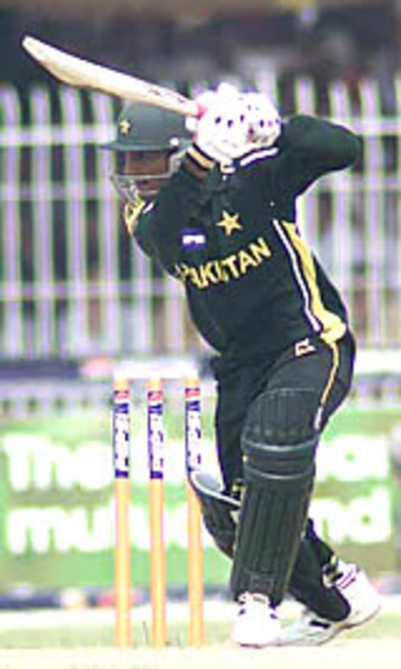 Abdul Razzaq drives during his quick 46*, Pakistan v South Africa, 3rd ODI, Faisalabad, October 7, 2003.