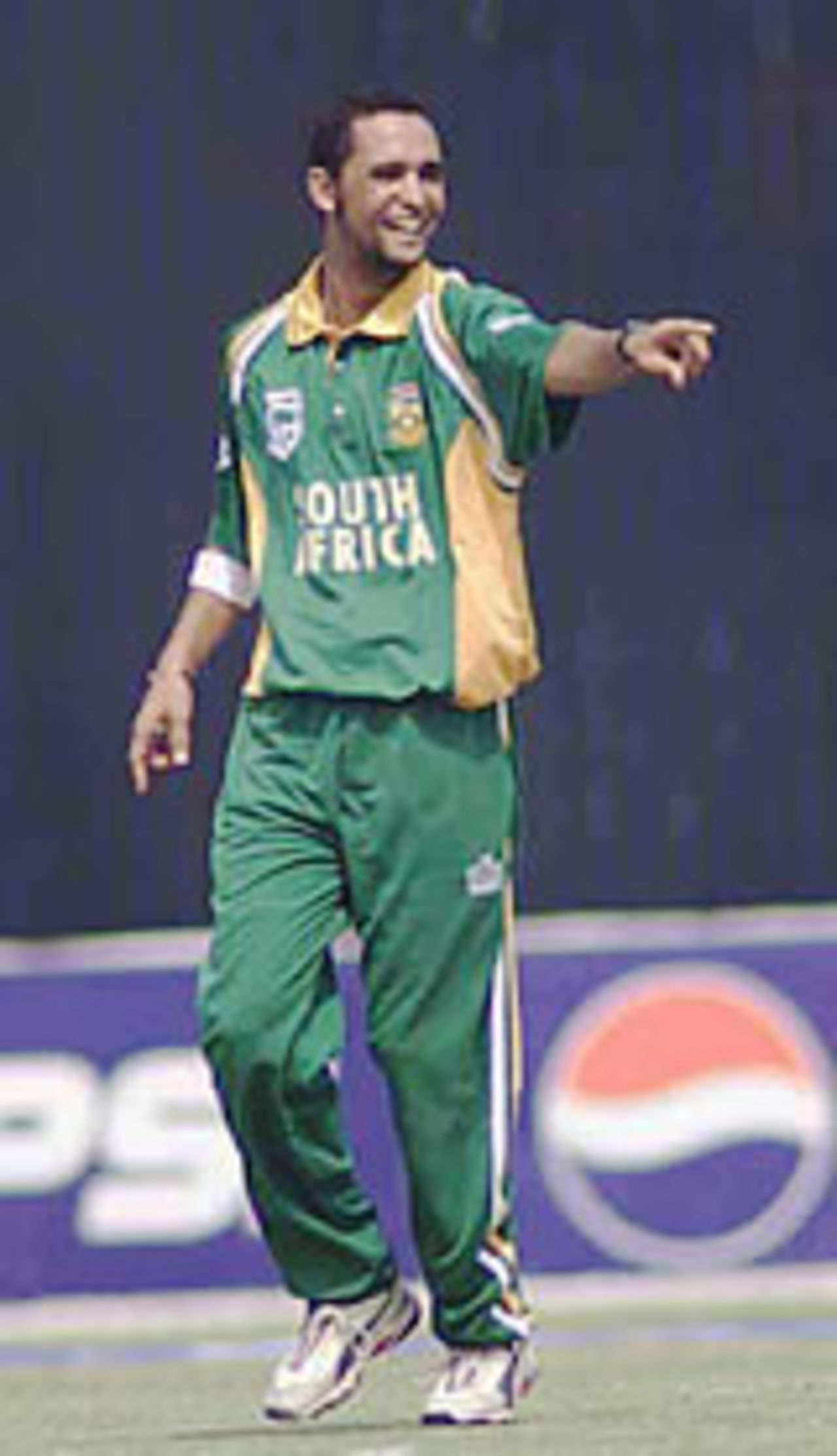 Robin Peterson celebrates a wicket, Pakistan v South Africa, 3rd ODI, Faisalabad, October 7, 2003.