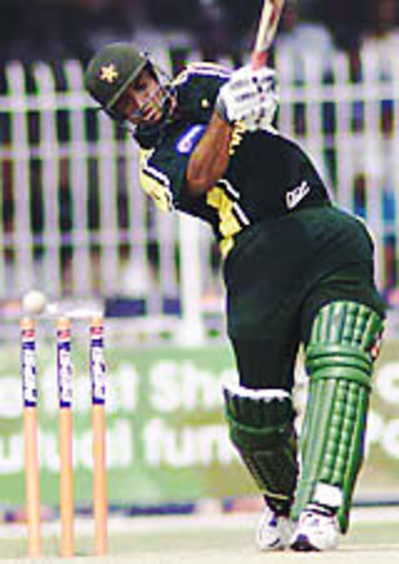 Shoaib Akhtar concentrates on his shot but loses his left bail to Makhaya Ntini, Pakistan v South Africa, 3rd ODI, Faisalabad, October 7, 2003.