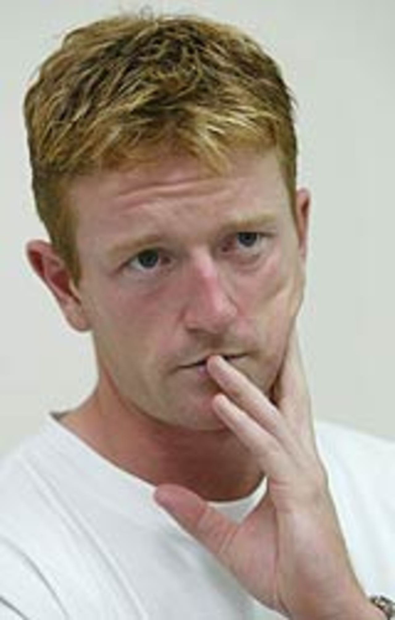 Paul Collingwood ponders the weather on arrival in Dhaka, October 9, 2003
