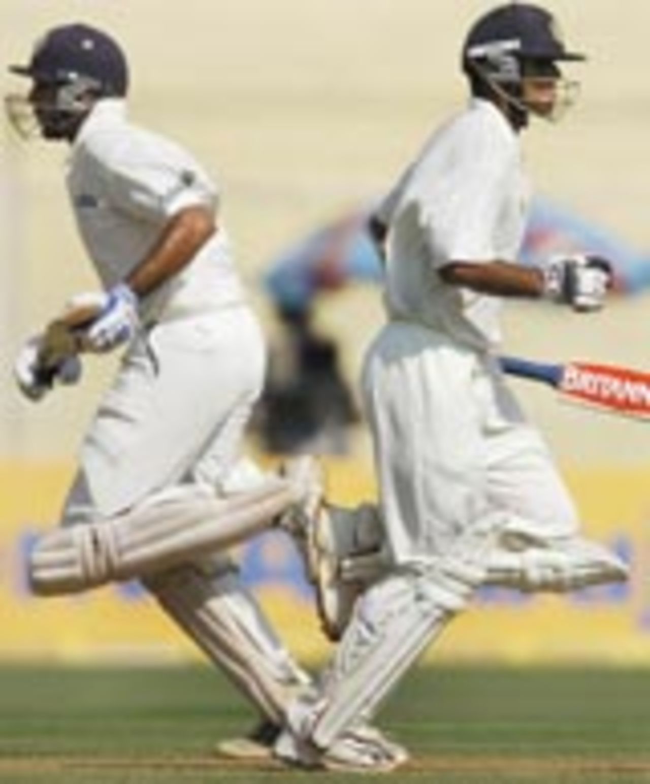 Rahul Dravid and VVS Laxman steal a run during the course of their partnership, India