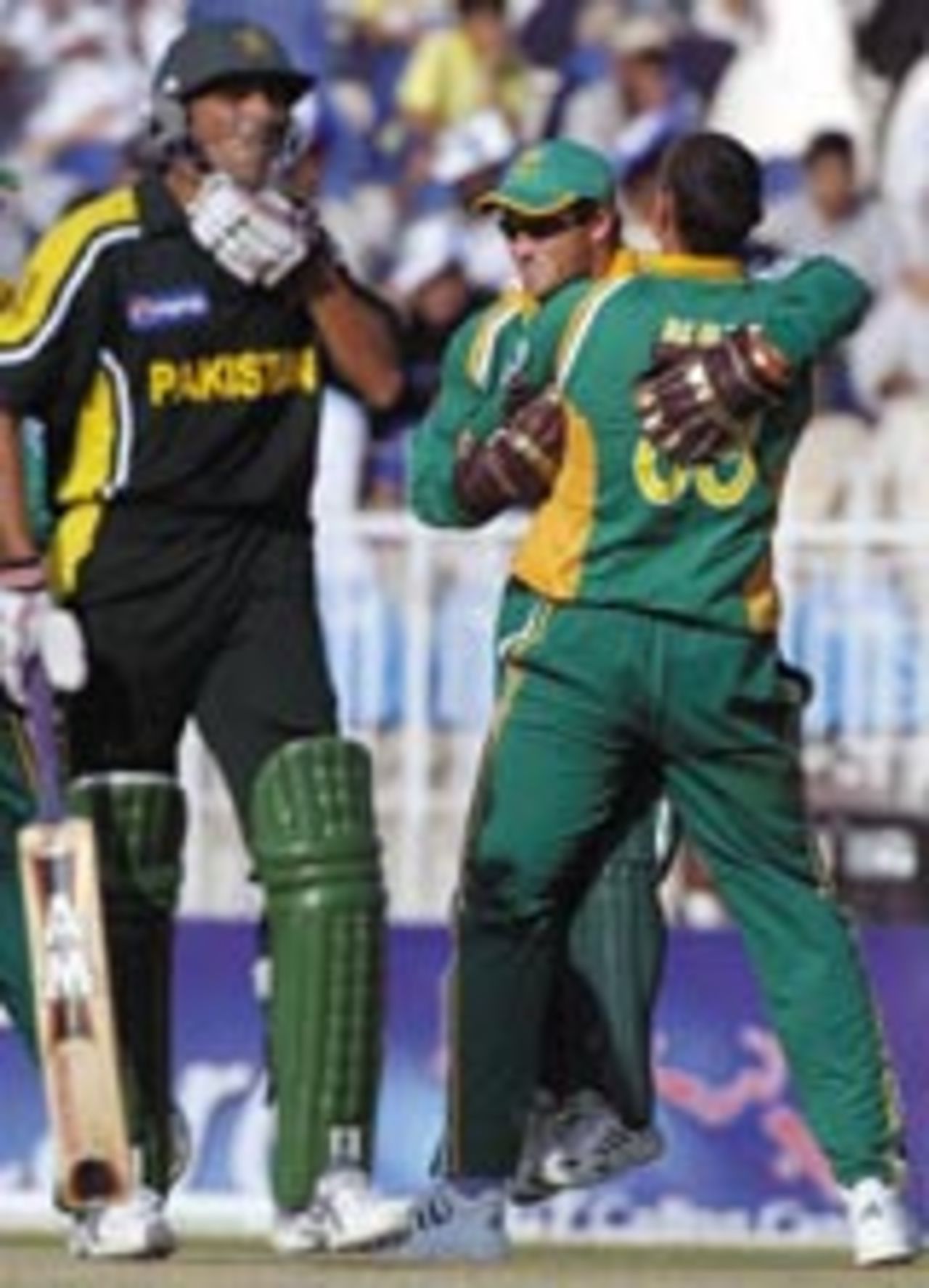 Andre Nel and Mark Boucher celebrate Younis Khan's dismissal, Pakistan v South Africa, 4th ODI, Rawalpindi, October 10, 2003