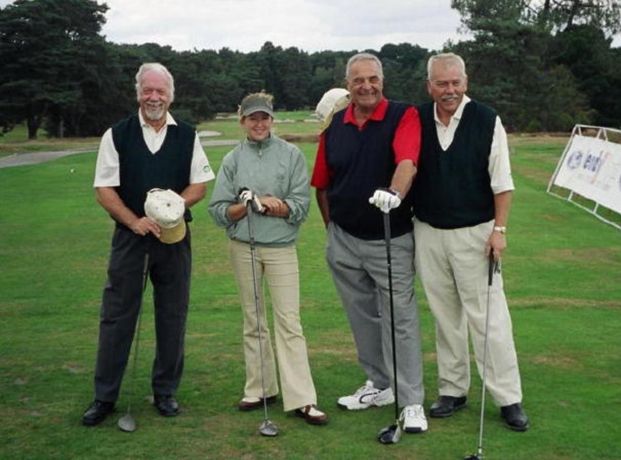 Merlo UK B team.  ohn L.Iles, John Walker, Derek Silk and golf professional Katie Huffam.