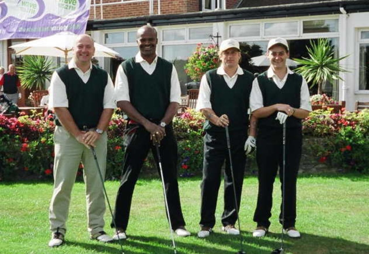 Merlo UK A team.  John P.Iles, Mark Whitely, Mike Stokes, Kriss Akabusi.