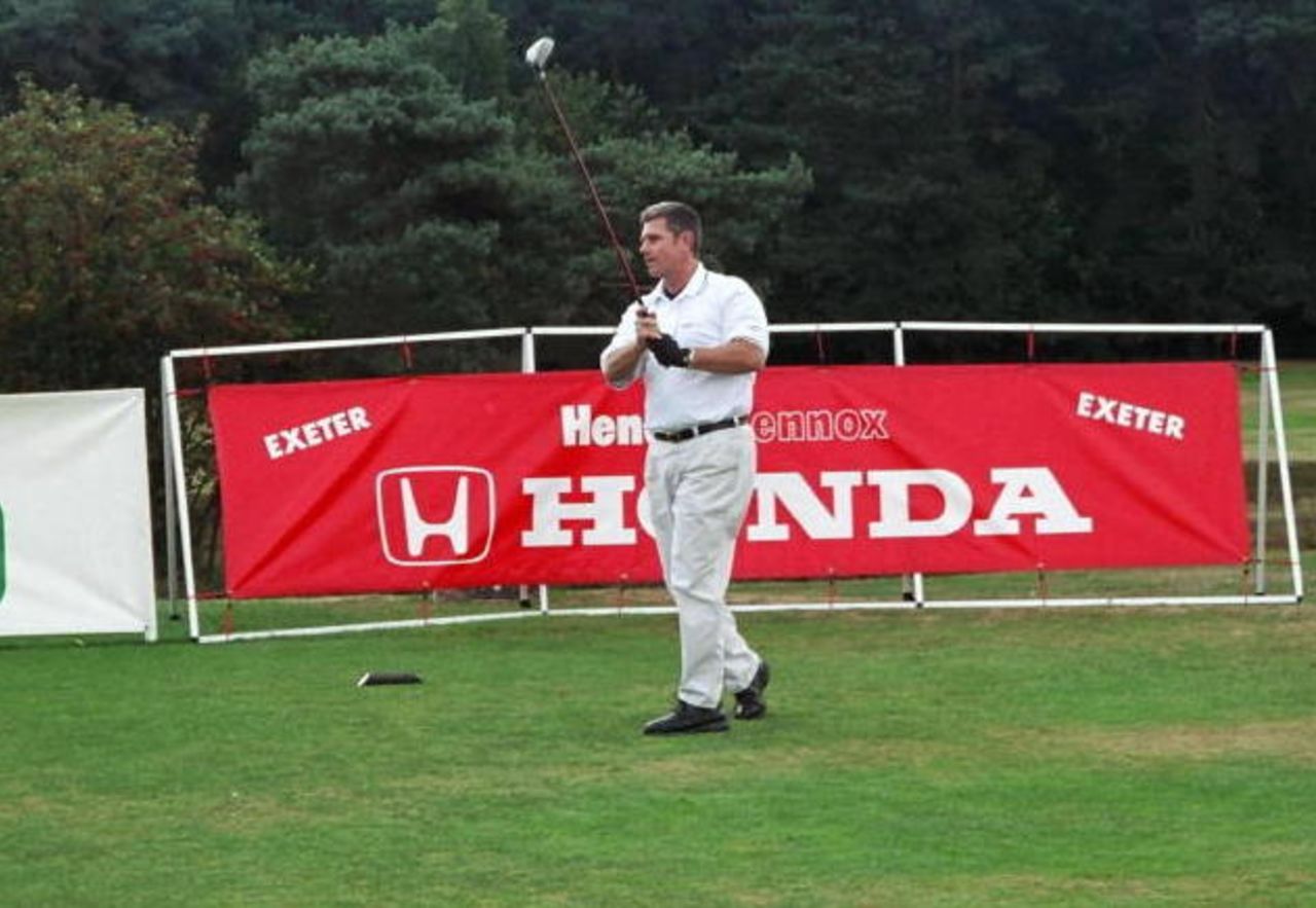 Robin Smith tees off.