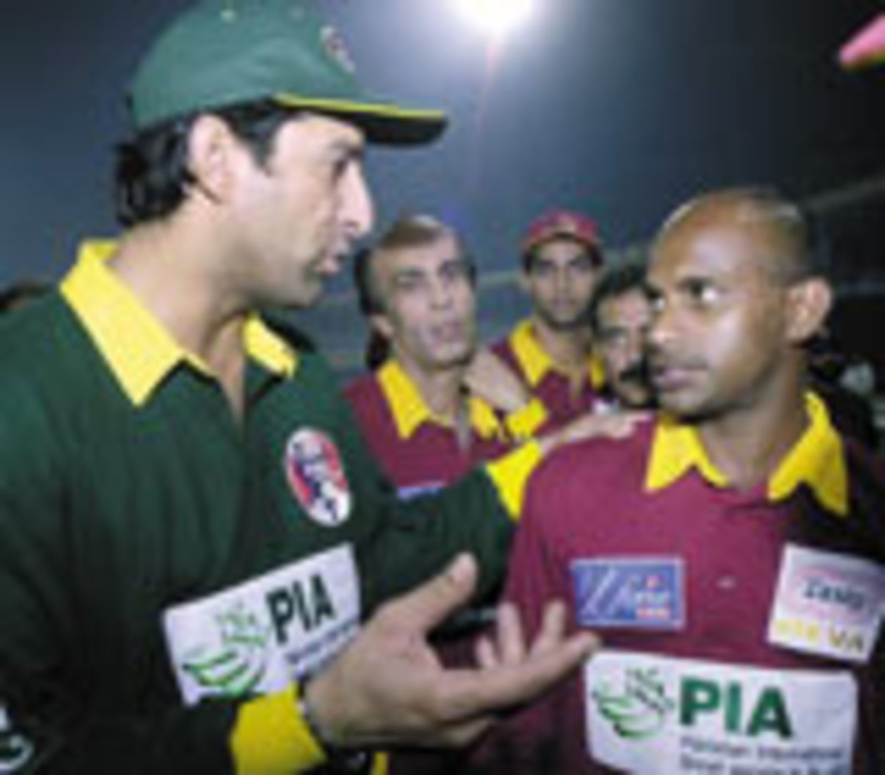Wasim Akram and Sanath Jayasuriya at the end of the charity match, Pakistan XI v World XI, Lahore, October 16, 2003