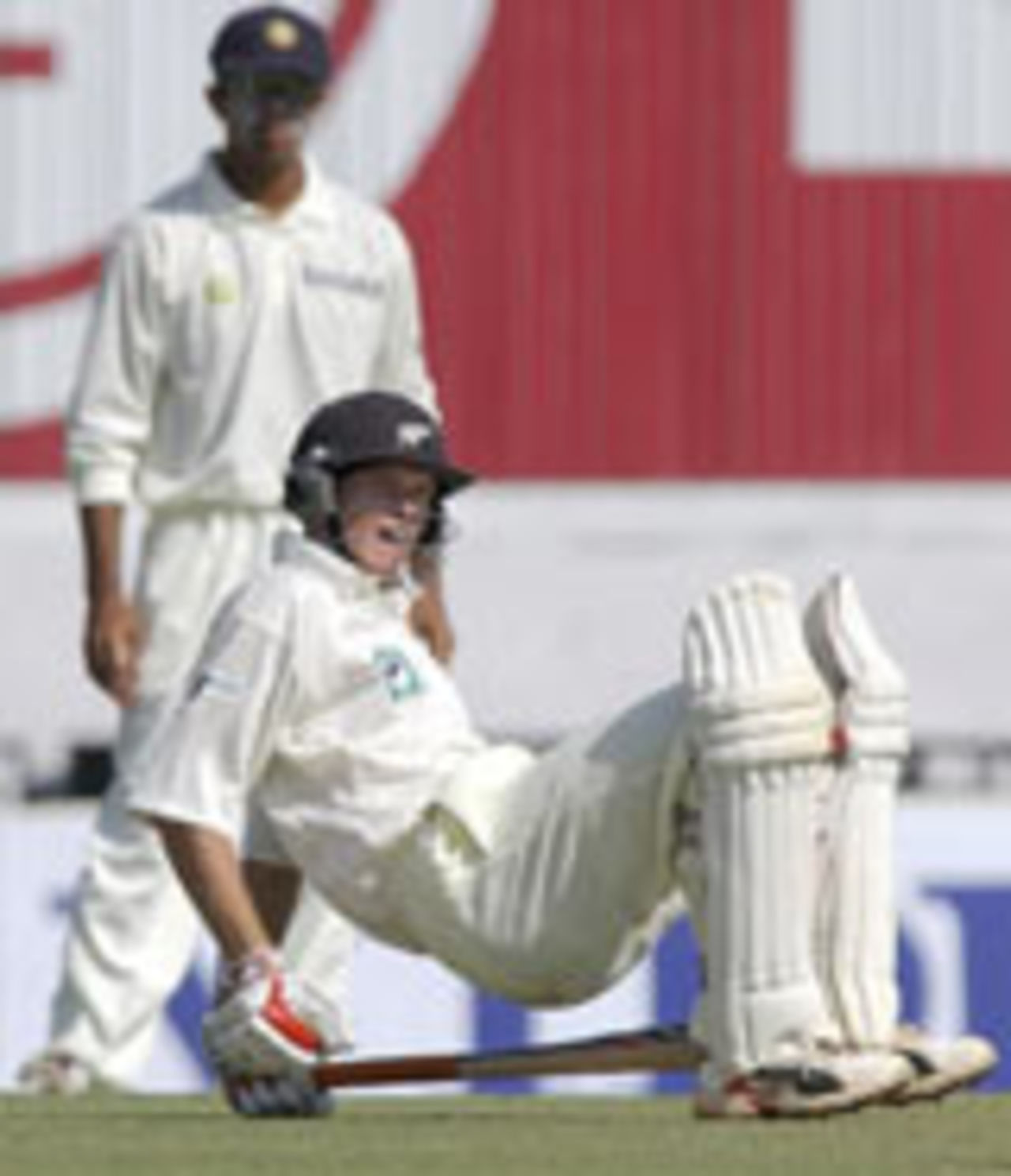 Lou Vincent falls after inside edging a ball on to his knee,India v New Zealand, 2nd Test, 1st day, Mohali, October 16, 2002