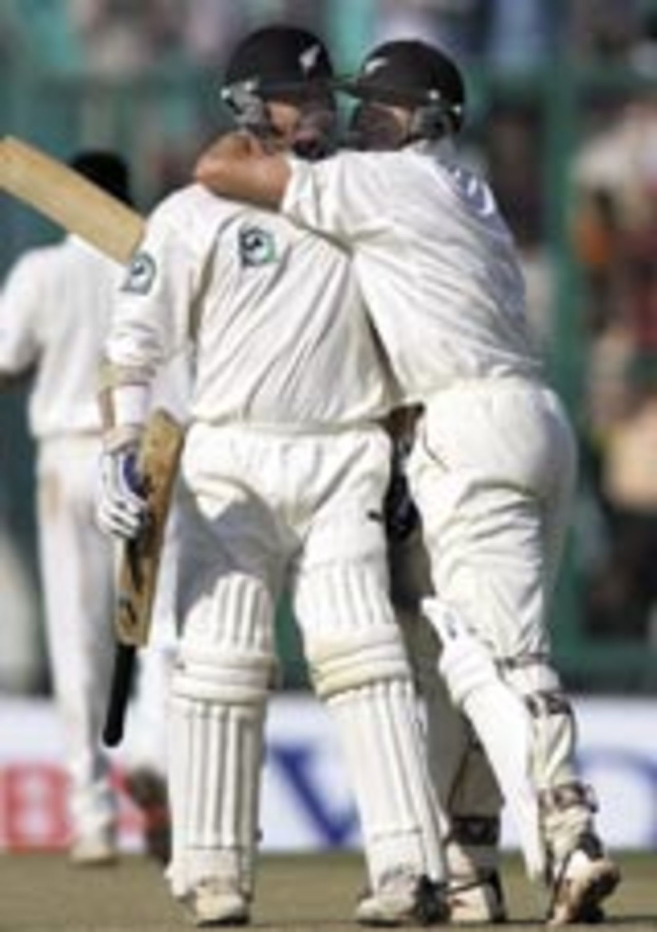 Mark Richardson hugs Lou Vincent after Vincent's hundred, India v New Zealand, 2nd Test, Mohali, 1st day, October 16, 2003