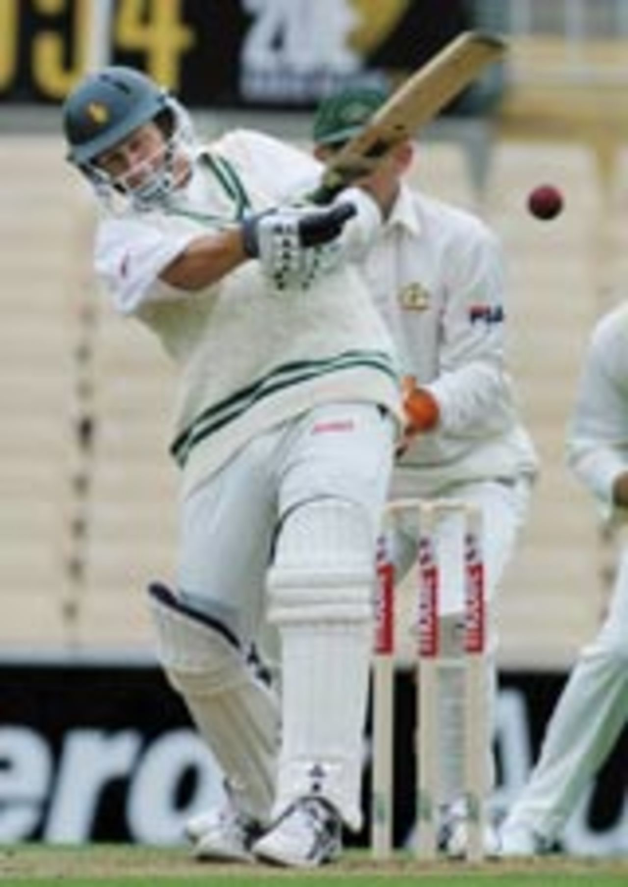 Stuart Carlisle swats Brett Lee for a four through mid-on, Australia v Zimbabwe, 2nd Test, Sydney, 1st day, October 17, 2003