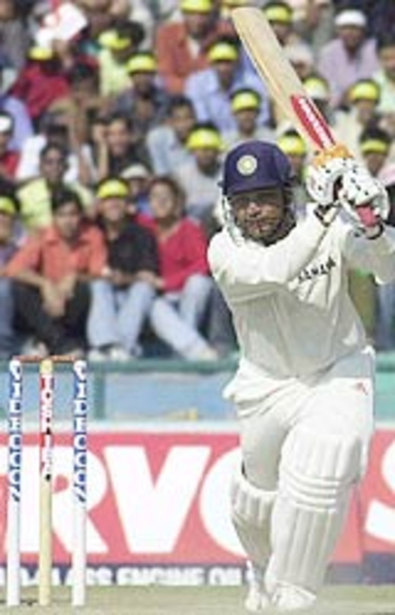 Virender Sehwag plays a sparkling cover-drive on his way to a century, India v New Zealand, 2nd Test, Mohali, October 18