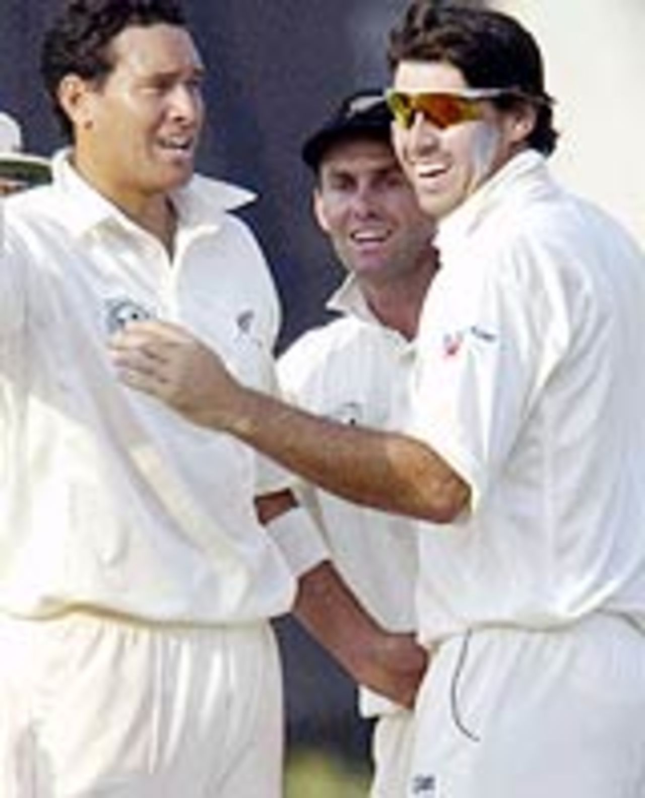 Daryl Tuffey celebrates with Stephen Fleming, India v New Zealand, 2nd Test, Mohali, October 19