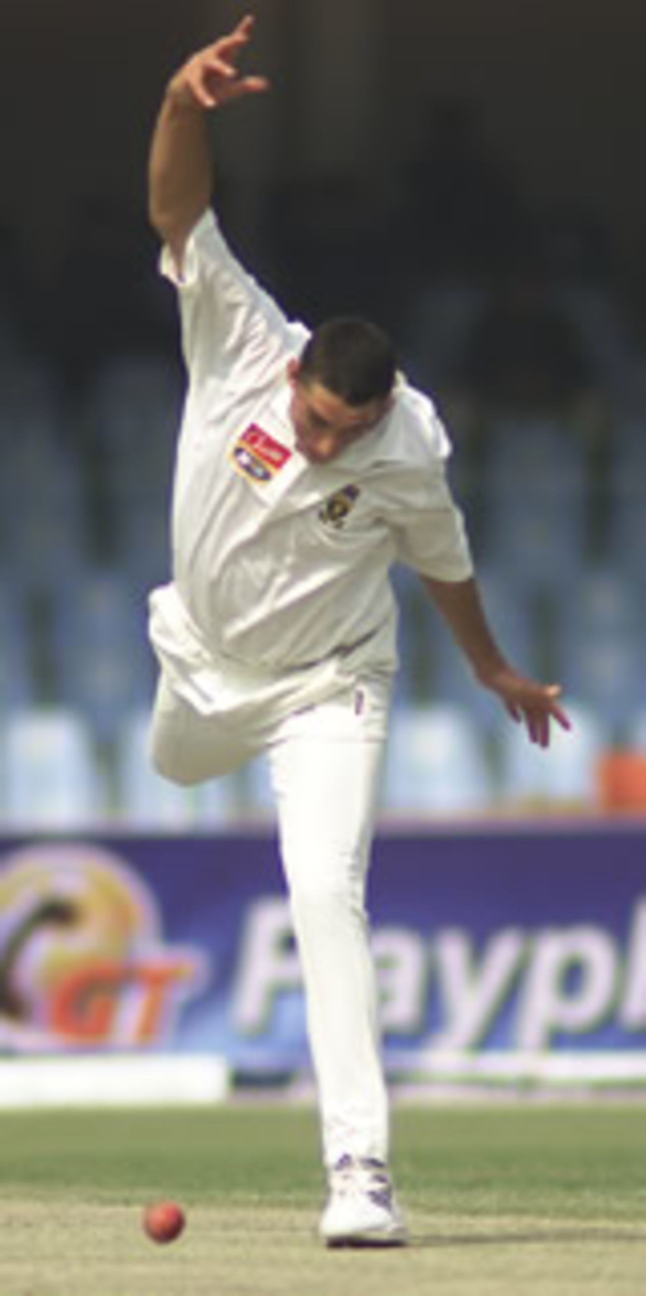 Andre Nel puts on a Paul Adams bowling style act, Pakistan v South Africa, Day 3, 1st Test, Lahore, October 19, 2003.