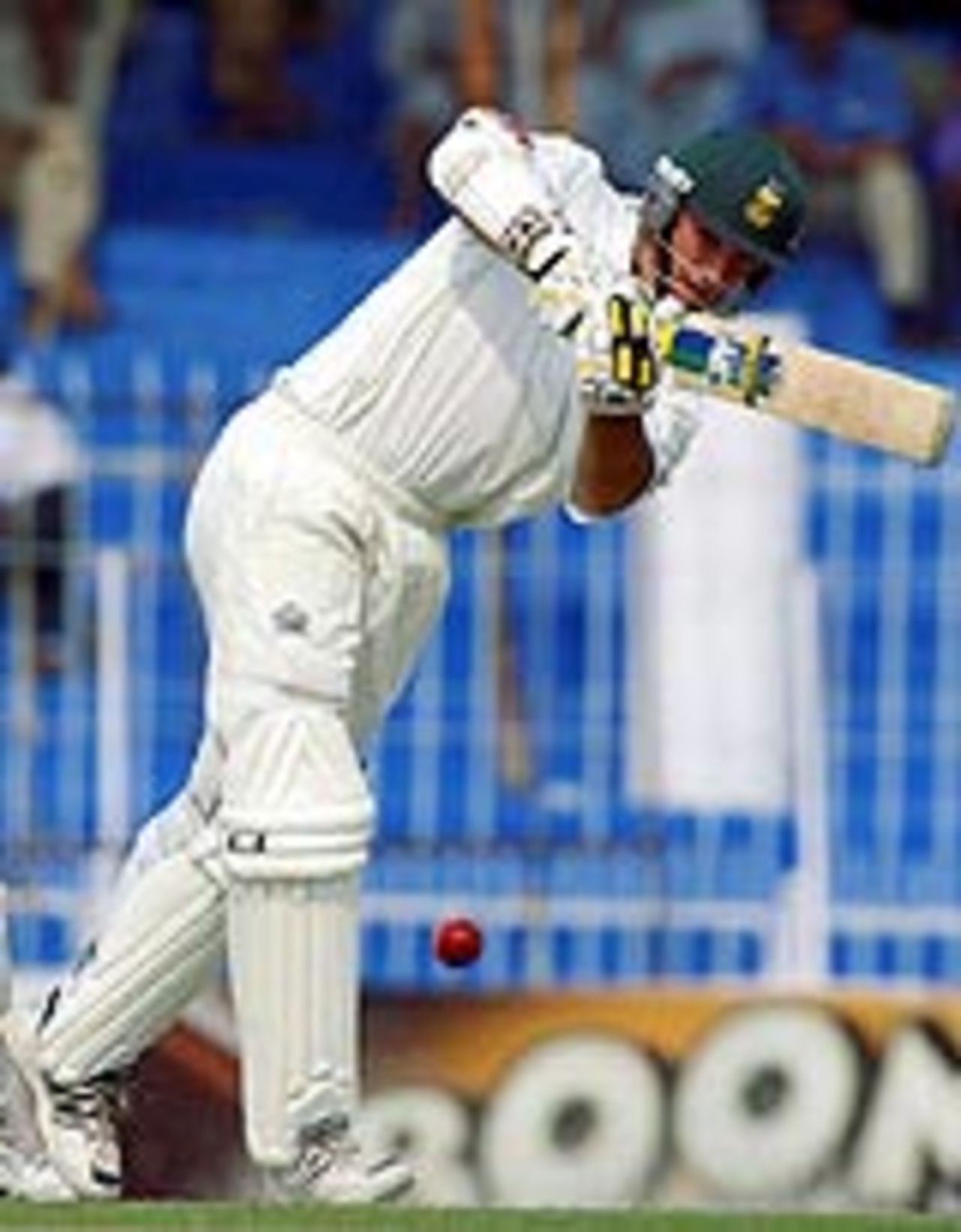 Graeme Smith drives Danish Kaneria, Pakistan v South Africa 2nd Test, Faisalabad, October 26 2003