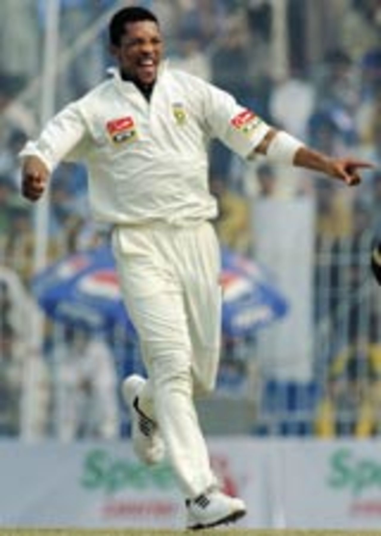 Makhaya Ntini celebrates a wicket, Pakistan v South Africa, 2nd Test, Faisalabad, 5th day. October 28, 2003