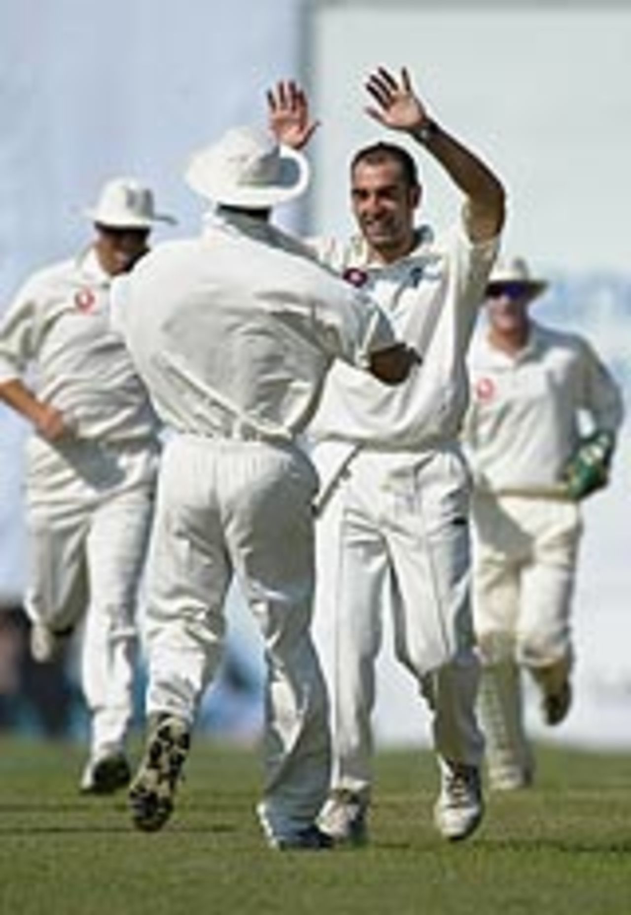 Richard Johnson celebrates taking England's first wicket