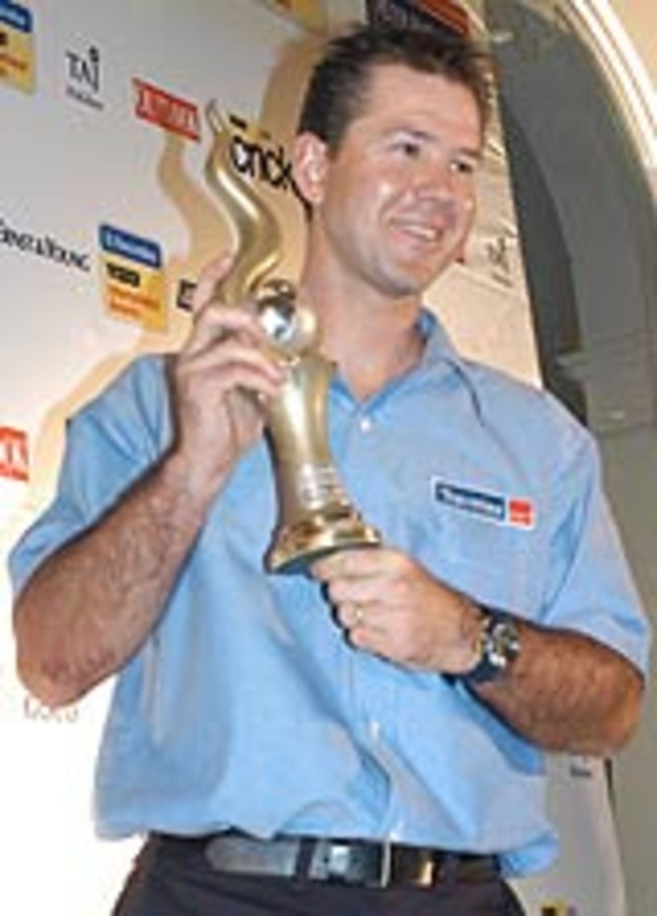 Ricky Ponting, the Electrolux Wisden Cricketer of the Year, poses with his trophy. October 30, 2003
