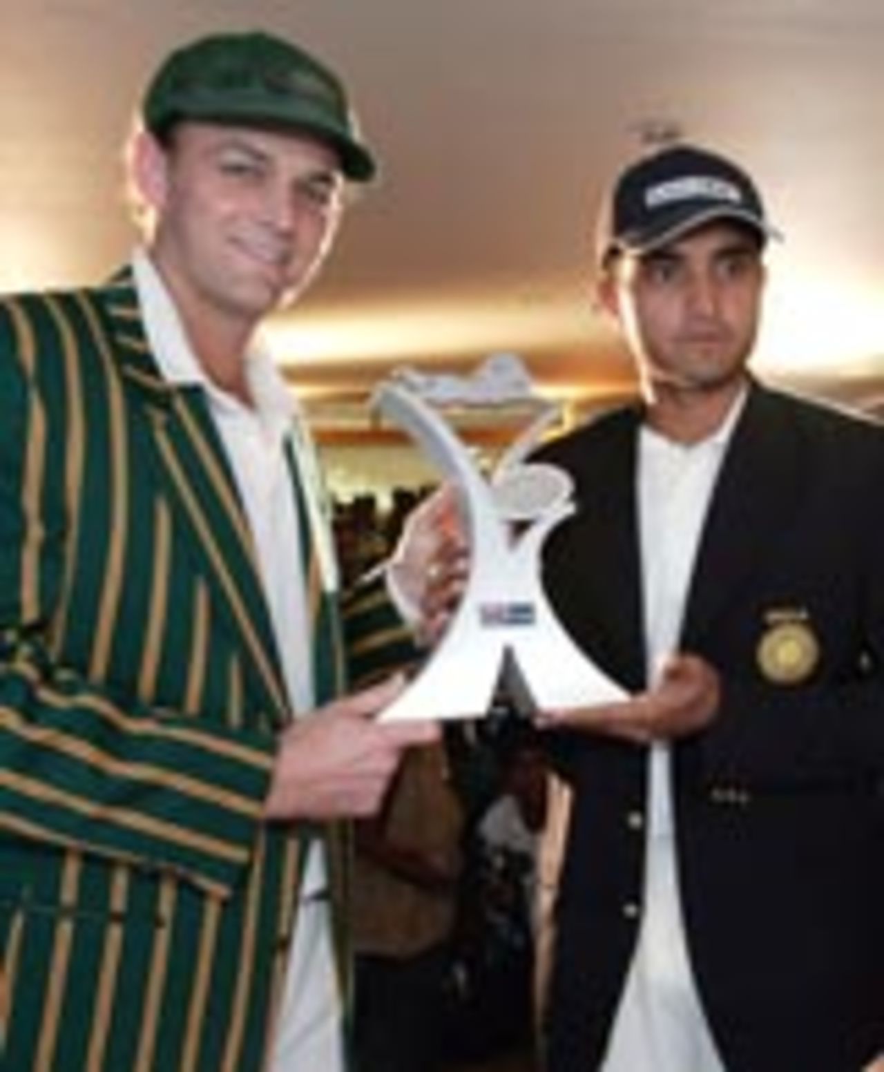 Sourav Ganguly and Adam Gilchrist pose with the Border-Gavaskar Trophy, Bangalore, October 5 2004
