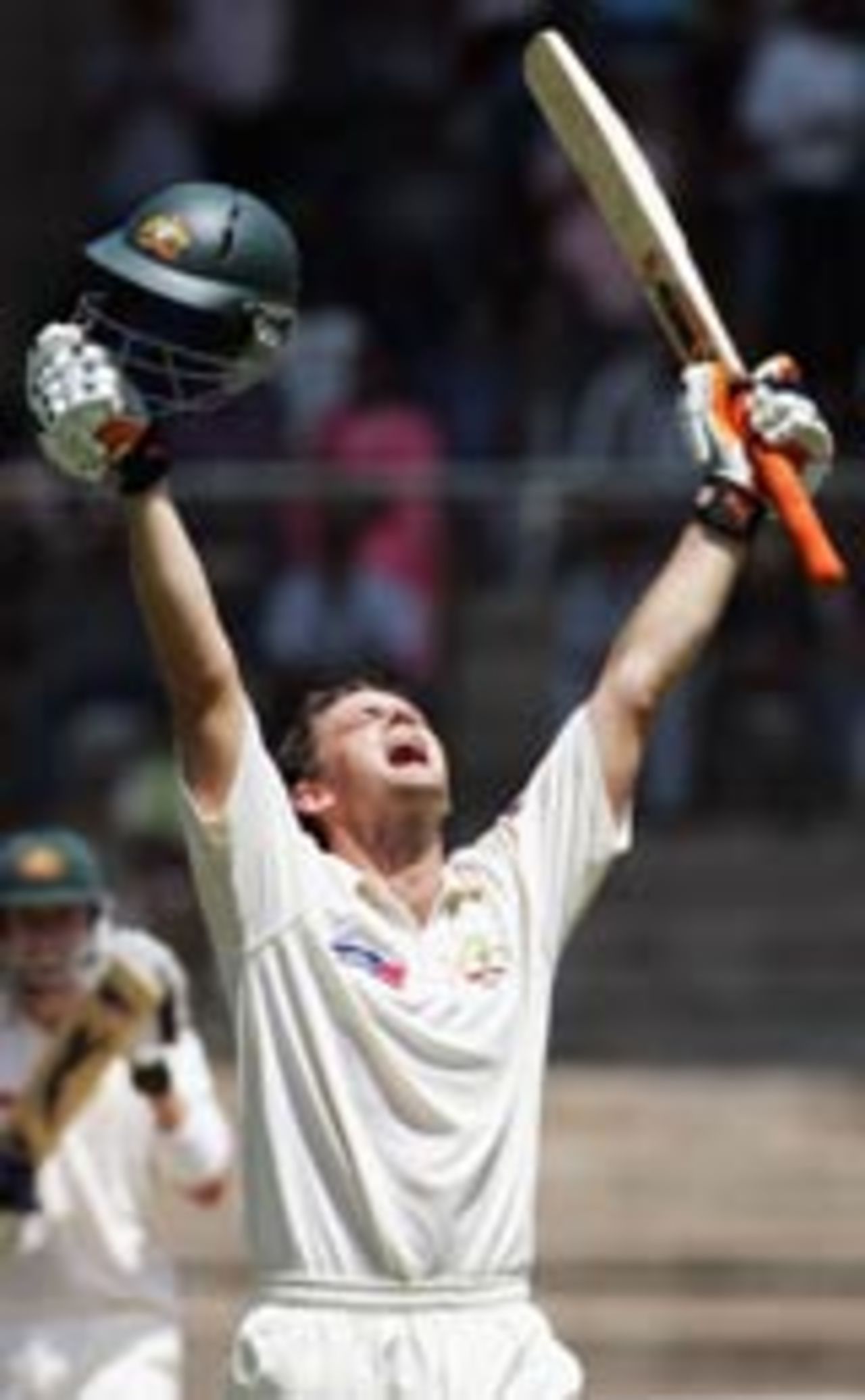 Adam Gilchrist exults after reaching a blistering century, Australia v India, 1st Test, Bangalore, 1st day, October 7, 2004