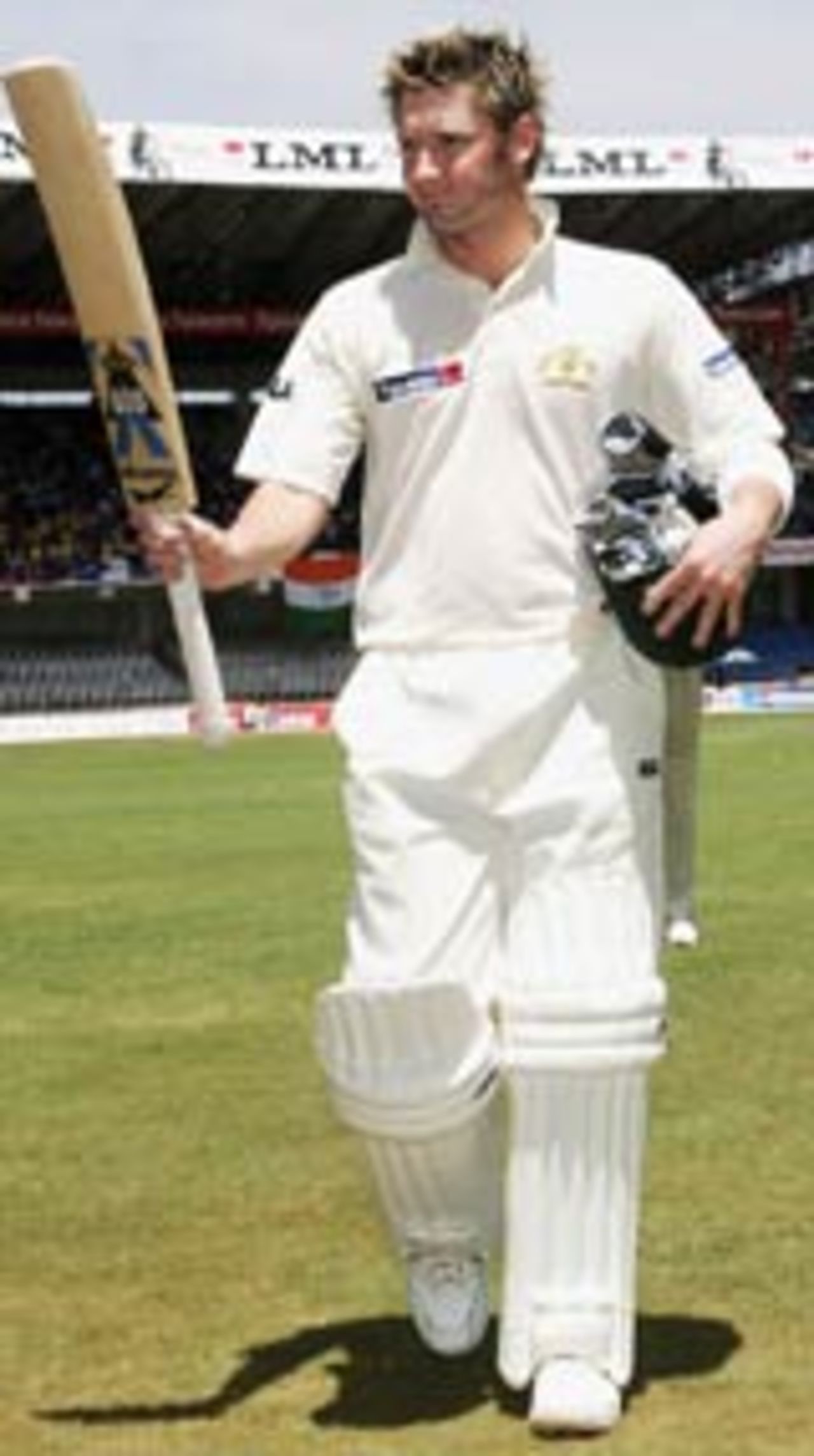 Michael Clarke walks off the field to applause from the fans and the opposition, Australia v India, 1st Test, Bangalore, 1st day, October 7, 2004