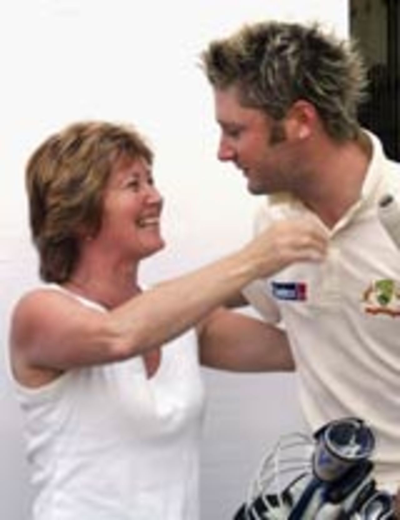Debbie Clarke hugs her son Michael after he scored a century on Test debut, Australia v India, 1st Test, Bangalore, 1st day, October 7, 2004